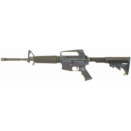 Bushmaster Model XM15-E2W M4 .223 caliber carbine with fixed A2 carry handle and 6 pos. Collapsible stock. New. (r2604)