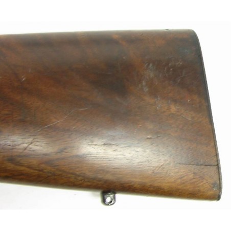 Winchester 94 .30 WCF caliber rifle. pre-64 model made in 1949. Has long forend wood and flat barrel band. The (w4612)