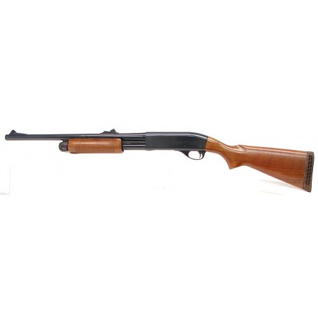 Remington 870 Wingmaster 12 gauge shotgun. 20 smooth bore slug gun with rifle sights, polished blue finish an (s3210)