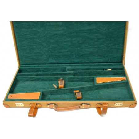 Double shotgun case made of canvas and leather. Holds 2 side by side ...
