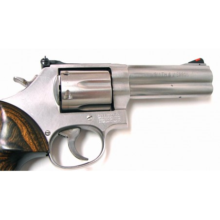 Smith & Wesson 686-6 .357 Mag caliber revolver. 4" 6-shot model with custom combat grips. Excellent condition. (PR18623)