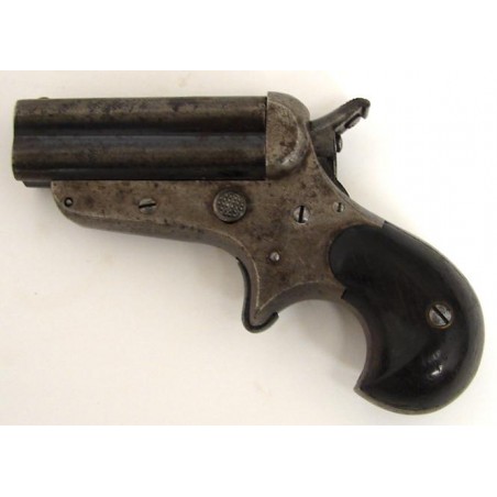 Sharps & Hankins Model 4B .32 caliber derringer with good bores. Has blue in barrel flutes and very good grips. Mechanically fin (ah2173)