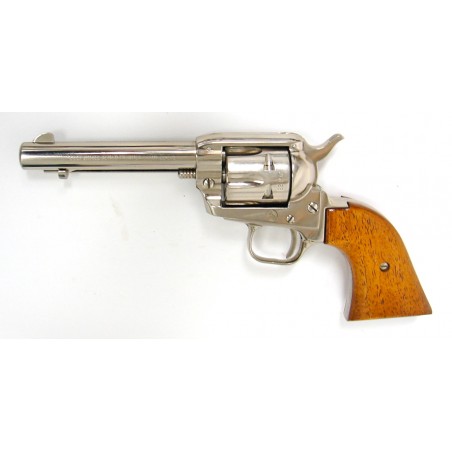 Colt Frontier Scout .22 LR/WMR caliber revolver. 4 3/4" model with nickel finish and dual cylinders. Made in 1967. Near excellen (C6377)