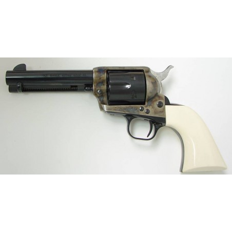 Colt Single Action Army .45 LC caliber revolver. 2nd generation 4 3/4" model with custom genuine ivory grips. Excellent conditio (C6959)