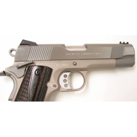 Colt Lightweight Commander .45 ACP caliber pistol. Stainless lightweight model with fiber optic sight. Excellent condition with  (C7552)