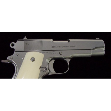 Colt Combat Commander .45 ACP caliber pistol. Bright polished stainless steel with genuine Ivory grips. A great looking piece! (C8096)