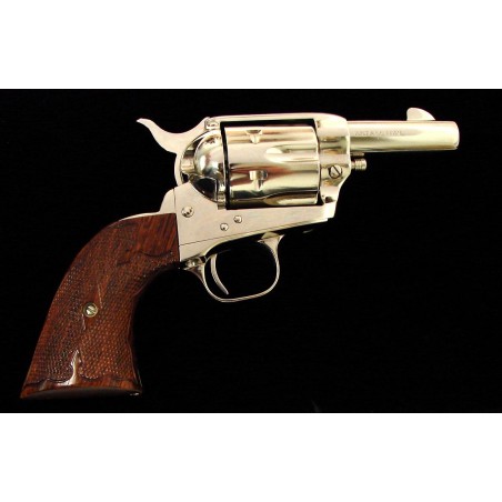 eriffs .44 Special caliber revolver. Rare dual cylinder model with nickel finish and deluxe walnut grips. Excellent cond (C8535)