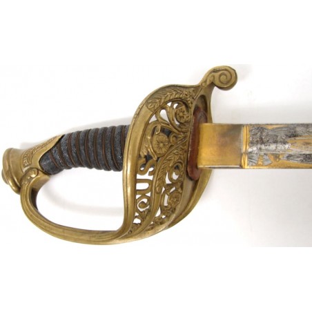 U.S. Model 1860 Officers sabre with gold washed blade with One and Inseperable. Patriotic motif. Blade by Clavberg. Hilt is 18 (sw750)