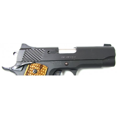 Kimber Pro Raptor II .45 ACP caliber pistol. 4" all steel model with reptile scales and night sights. Very good condition. (PR15523)