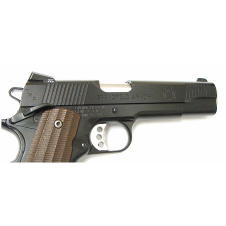 Springfield 1911A1 Tactical .45 ACP caliber pistol. TRP model with Black coating and custom G-10 grips. Excellent condition. (PR20177)
