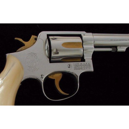 Wesson 10-6 .38 Special caliber revolver. 1970s vintage 4 heavy barrel model with custom nickel and gold finish and re (PR20736)