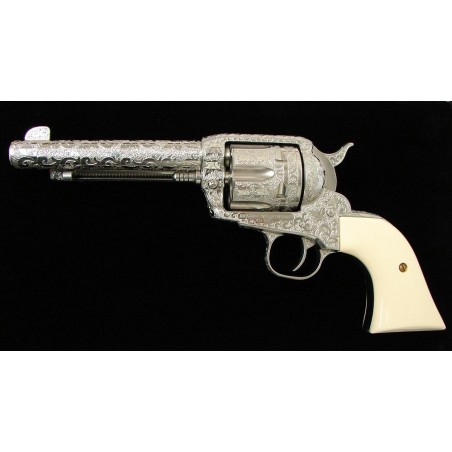 Ruger Vaquero .45 LC caliber revolver. Custom engraved 5 1/2" model with full coverage scroll and maple leaves and faux ivory gr (PR23744)