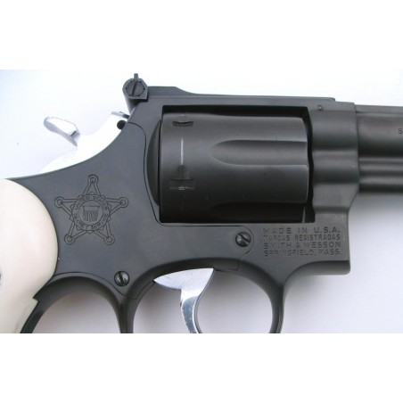 Smith & Wesson 19-3 .357 Magnum caliber revolver. Special 3 barrel model with Secret Service markings, special finish & ivory g (pr5461)