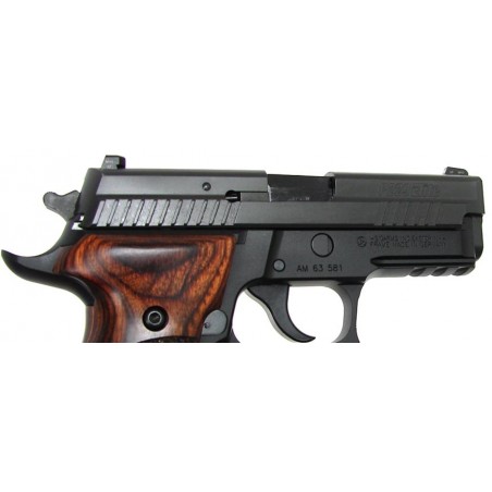 Sig-Sauer P229 Elite .40 S&W caliber pistol with custom wood grips, front and rear slide serrations and night sights. New. (pr7464)