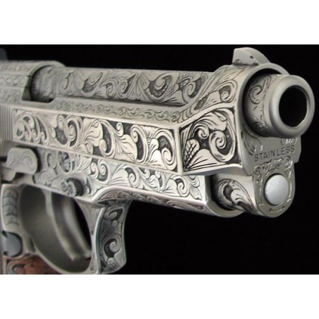 Beretta 92FS 9mm Para caliber pistol. Custom engraved stainless model with full coverage deep relief scroll engraving and fancy  (pr8836)