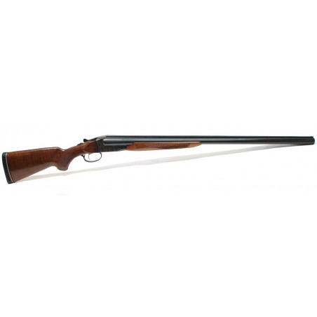Savage Model B 12 gauge shotgun. Deluxe side by side with 28" vent rib barrels, checkered walnut stock and engraved receiver. Ne (S5646)