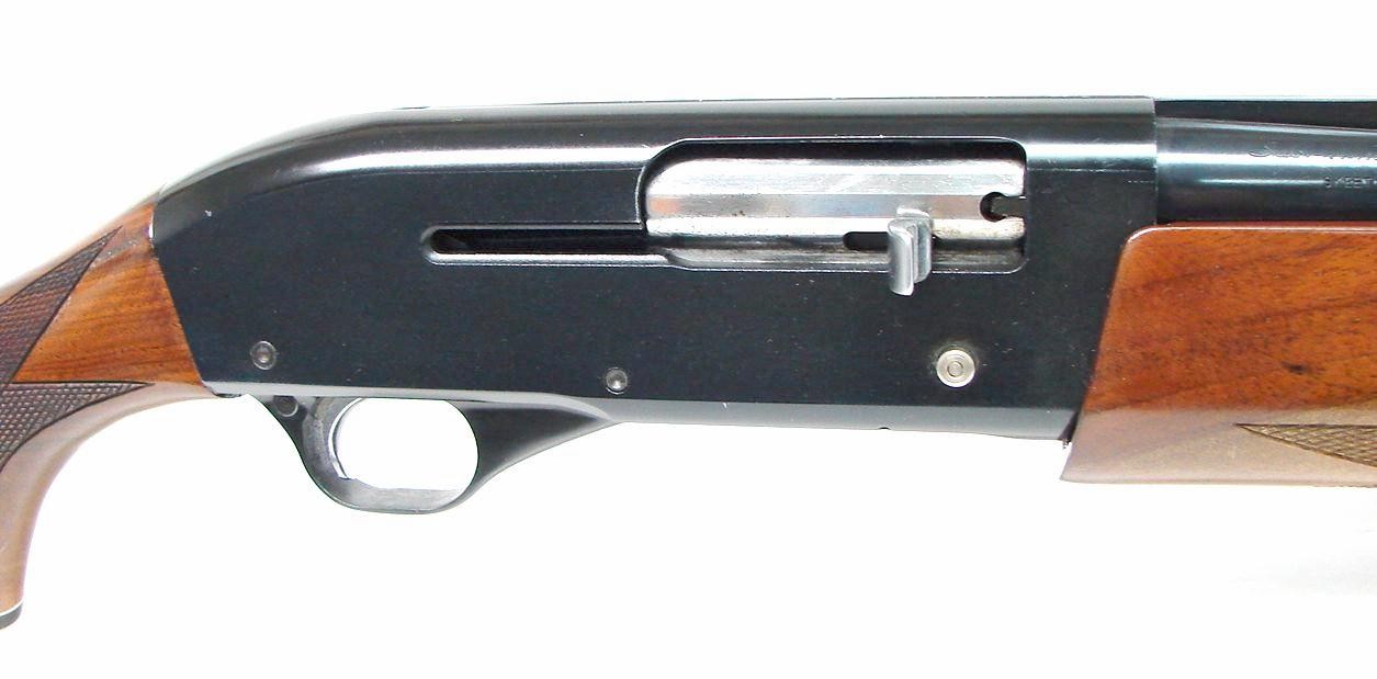 High Standard Shadow 12 gauge shotgun. Semi-auto Skeet gun with 26 high  rib barrel and nicely figured Walnut. Has an extra 26 (S4867)