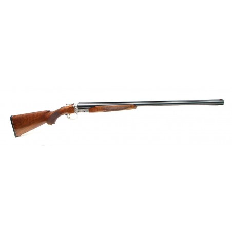 SKB 200E 12 gauge shotgun. Side by side field gun with 28" modified/full barrels, fully engraved receiver, single selective trig (S4768)