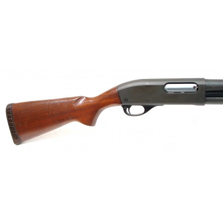 Remington 870 Wingmaster 12 gauge shotgun. Early model Riot Gun with 18" barrel, wood stock and parkerized finish. Shows use. Ve (S4651)