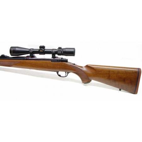 Ruger M77 7 X 57 caliber rifle. Early model with tang safety and iron sights, in popular 7 X 57 Mauser caliber. With Nikon 3 X 9 (R12959)