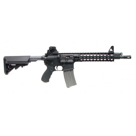 LMT Defender 2000 5.56 caliber rifle. MRP CQBPS model with Monolithic upper receiver, piston driven system, BUIS, Ergo grip, SOP (R12913)
