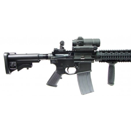Sendra Corp. XM15 E2 .223 Rem. caliber rifle. Customized M4 type carbine with Colt complete upper receiver. Aimpoint M4 Red Dot  (R10550)