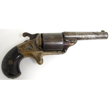 Moore Teat Fire revolver. Good blue on cylinder. Barrel blue has flaked. 90% varnish on grips. (ah1576)
